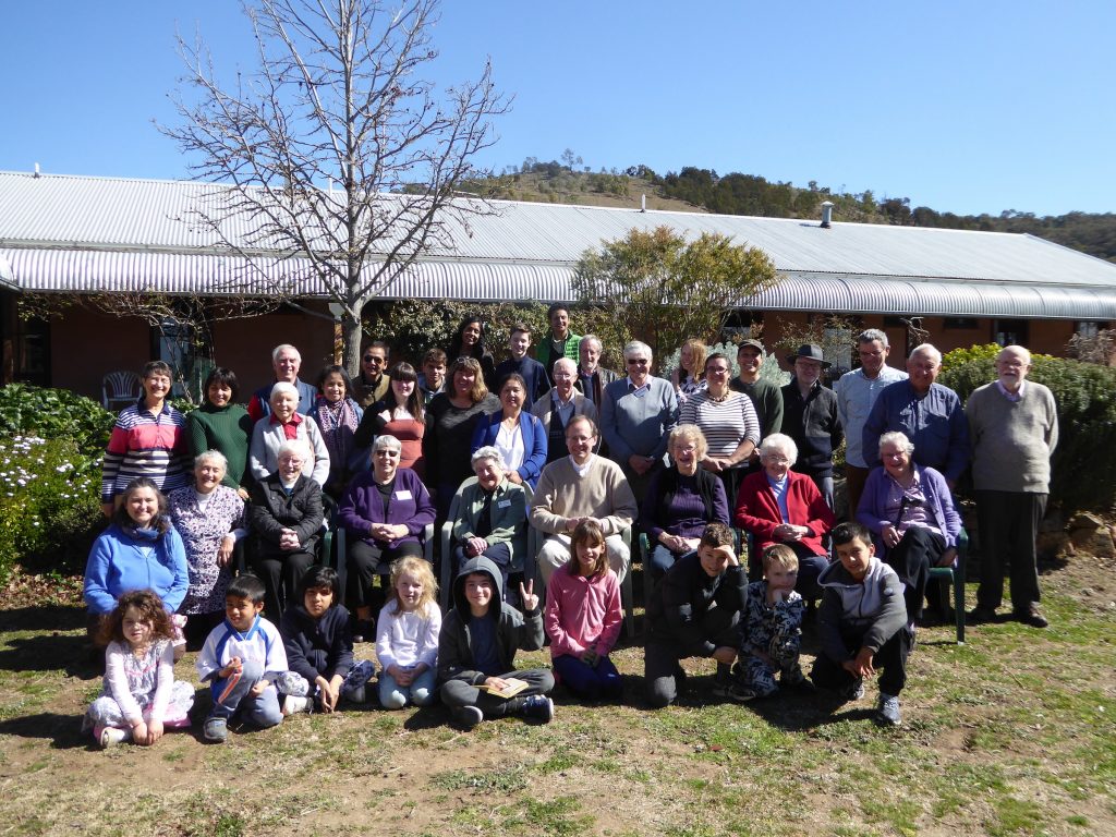 Large group gathered outside Silver Wattle Centre for group photograph
